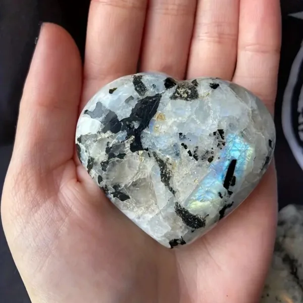 White and black heart-shaped moonstone.