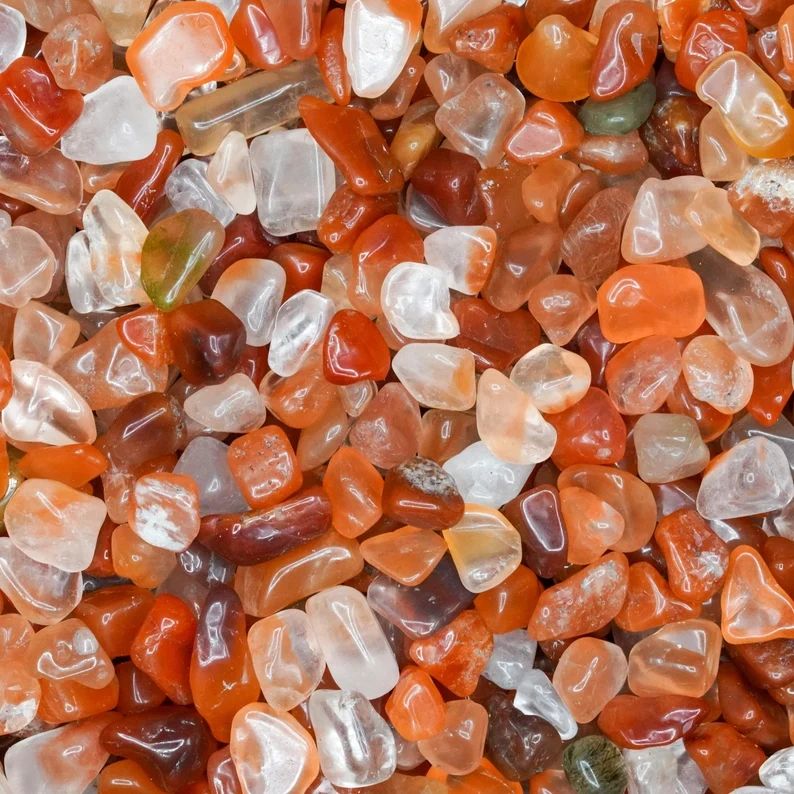 Red and clear tumbled stones.