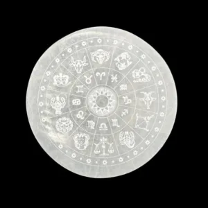 White selenite zodiac wheel with symbols.