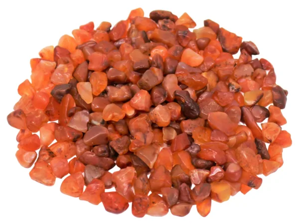 Pile of red carnelian gemstones.