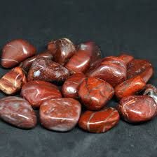 Red and white striped tumbled stones.