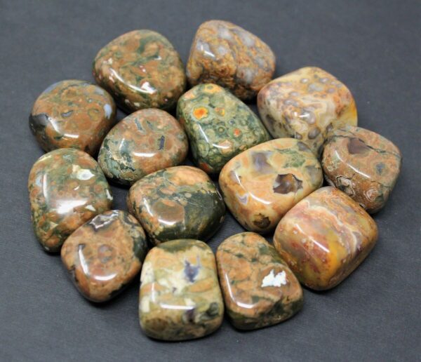 Polished green, brown, and orange stones.