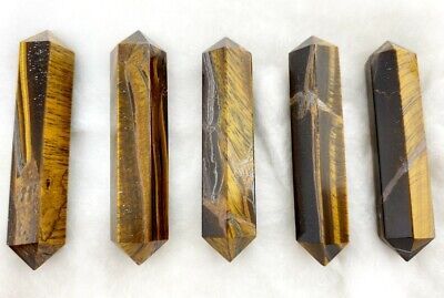 Five tiger's eye crystal wands.