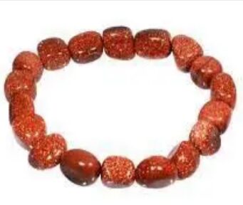 Red and orange gemstone bracelet.