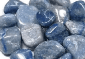 Blue and grey tumbled gemstone pebbles.