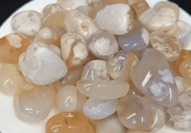 A pile of white and brown agate stones.