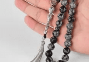 Black and grey stone prayer beads.