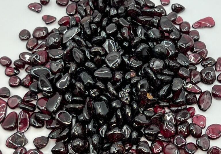 Pile of dark red garnet stones.