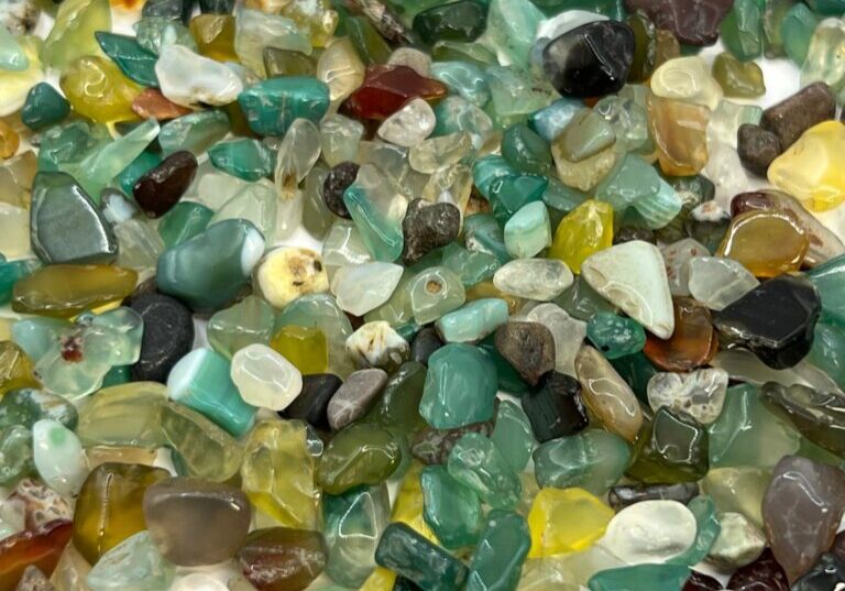 Assortment of green, yellow, and brown stones.