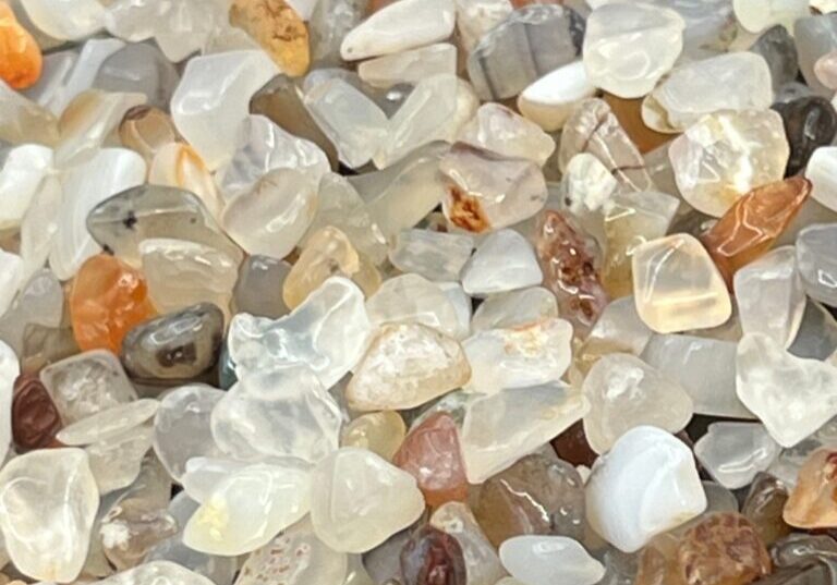 White agate tumbled stones, close-up.