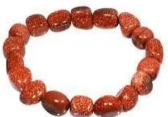 Red and orange gemstone bracelet.